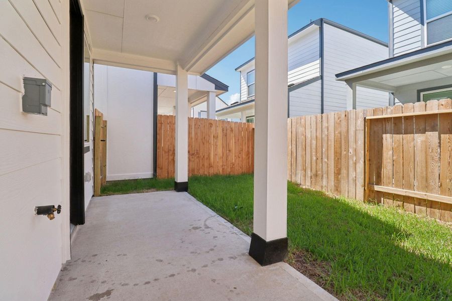 Exterior details and patio area of a home in Spring Brook Village - City Series, Houston (Image 3). Exterior details and patio area of a home in Spring Brook Village - City Series, Houston (Image 3).