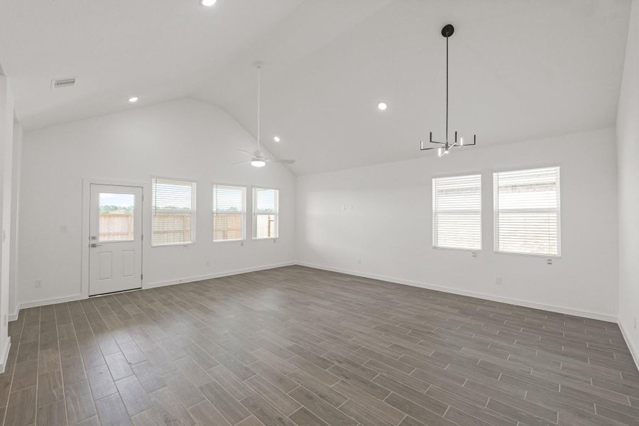 Open great room and dining area (*Photo not of actual home and used for illustration purposes only.)