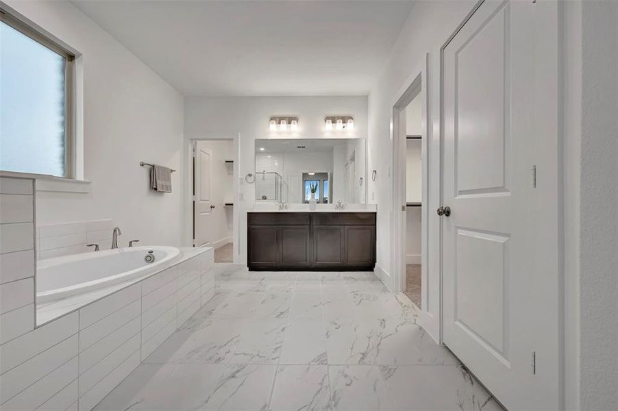 Furnished interior view inside a new home in Lily Creek at Sutton Fields, Aubrey (Image 16).