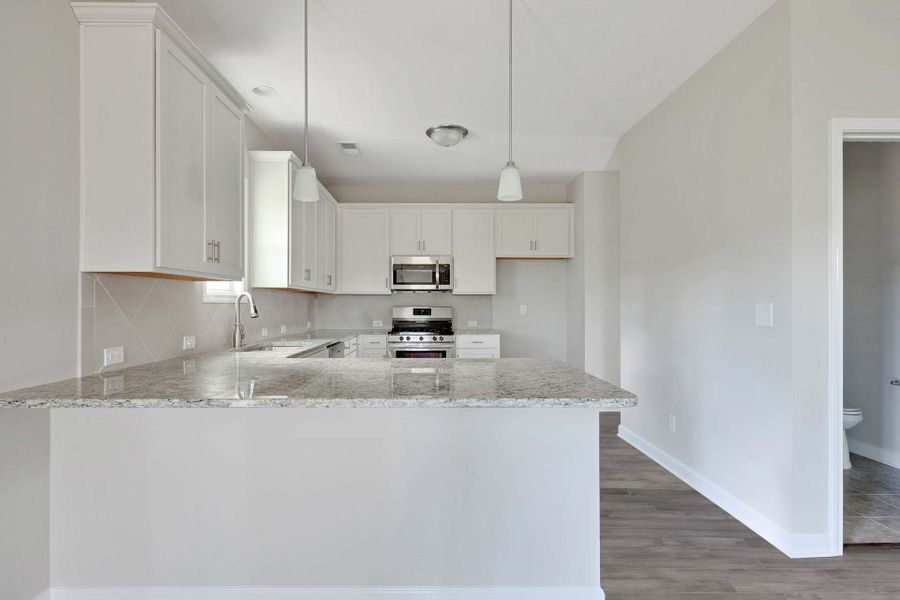 Representative furnished interior of a home built from the Meadowbrook by Caviness & Cates Communities in Sutherland Station at Olde Liberty, Franklinton (Image 161). Representative furnished interior of a home built from the Meadowbrook by Caviness & Cates Communities in Sutherland Station at Olde Liberty, Franklinton (Image 161).