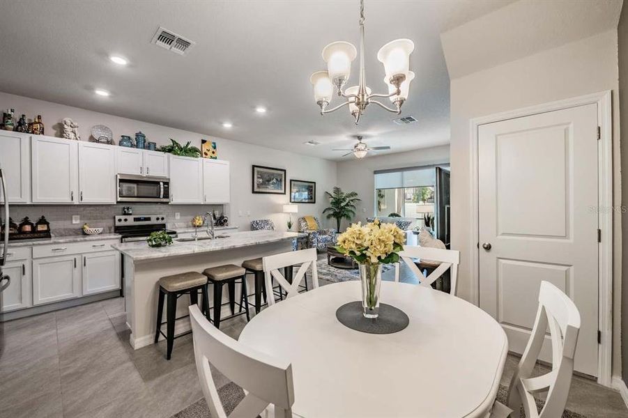 Furnished interior view inside a new home in Azalea Shores, Largo (Image 12).