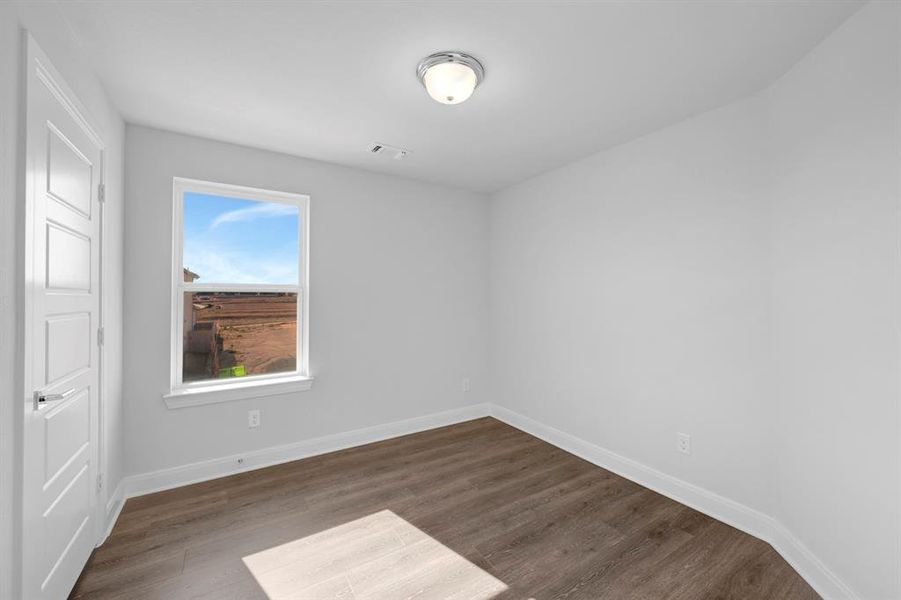 Spacious, unfurnished interior of a new home in Painted Tree Woodland West – Cottages, McKinney (Image 32).