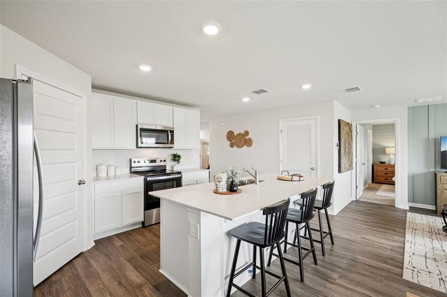 Furnished interior view inside a new home in Leoma's Landing, Lake Wales (Image 6).