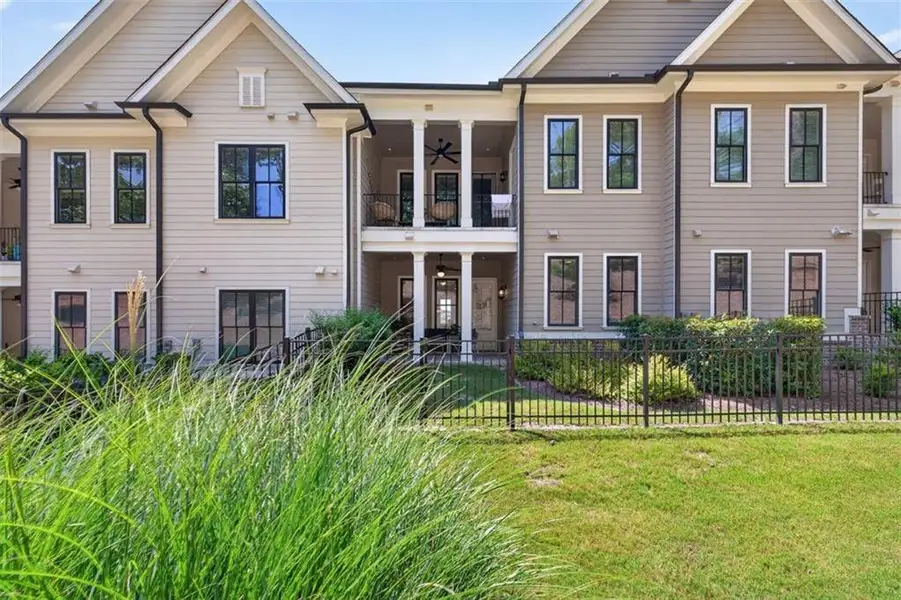Front exterior of a new home in , Peachtree Corners, GA, highlighting curb appeal (Image 2). Front exterior of a new home in , Peachtree Corners, GA, highlighting curb appeal (Image 2).
