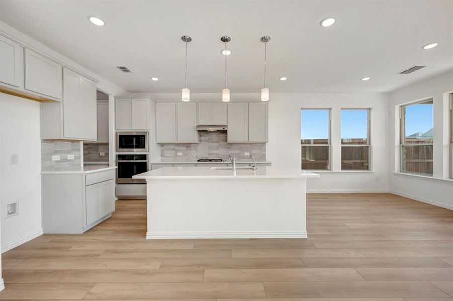 Furnished interior view inside a new home in Lily Creek at Sutton Fields, Aubrey (Image 4).