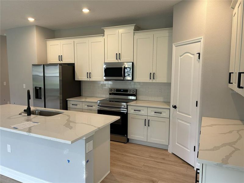 Furnished interior view inside a new home in , Dunnellon (Image 9).