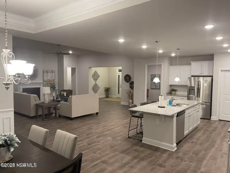 Furnished interior view inside a new home in Windfield, Grimesland (Image 4).