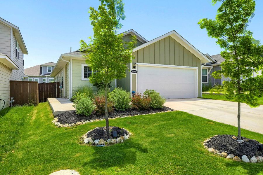 A charming single-story home with a well-maintained lawn and inviting curb appeal. A charming single-story home with a well-maintained lawn and inviting curb appeal.