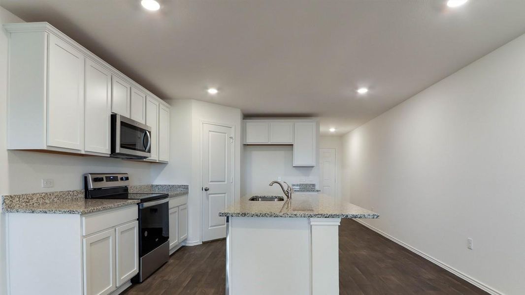 Furnished interior view inside a new home in Palomino, Manor (Image 6).