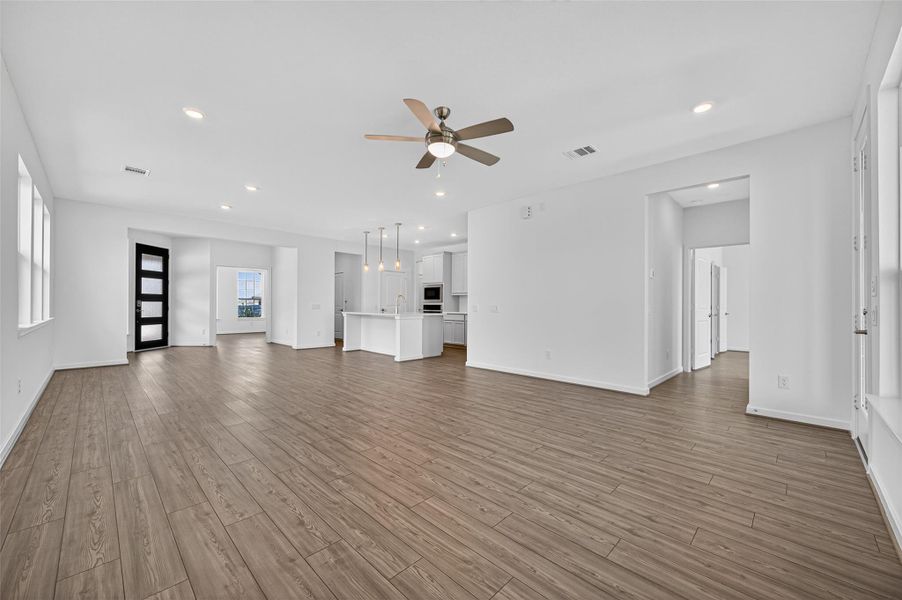 This open layout provides a clear view of the hallway leading to the bedrooms, creating an easy flow between the main living areas and private spaces.