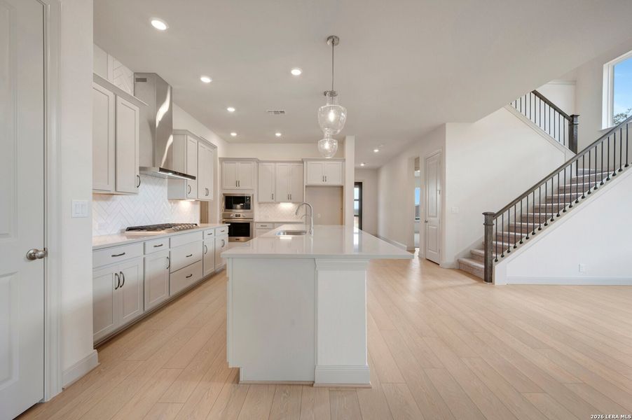 Furnished interior view inside a new home in Windsong - Legacy Series, Boerne (Image 5).