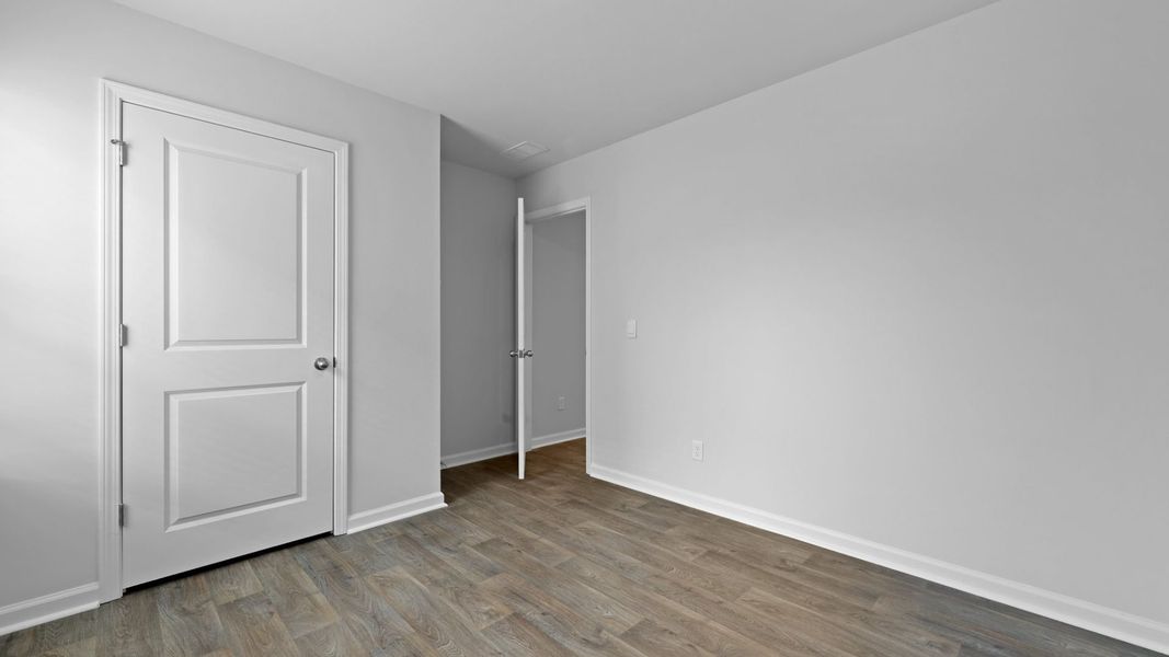 Representative unfurnished interior of a home built from the HELENA by D.R. Horton in Center Pointe, Santee (Image 17).