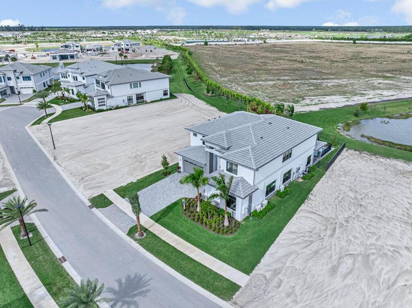 Exterior details and patio area of a home in Apex at Avenir, Palm Beach Gardens (Image 4). Exterior details and patio area of a home in Apex at Avenir, Palm Beach Gardens (Image 4).