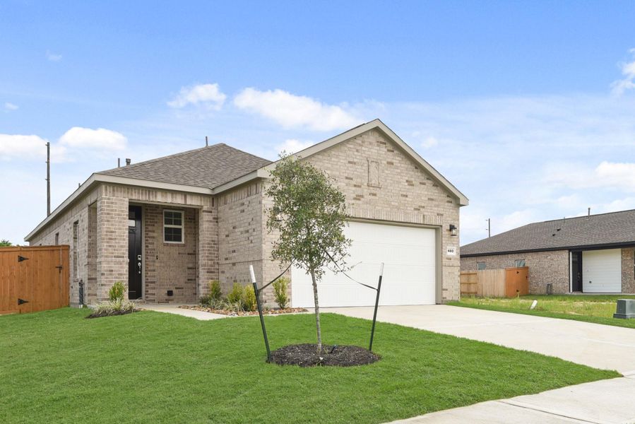 Front exterior of a new home in River Ranch Trails, Dayton, TX, highlighting curb appeal (Image 2). Front exterior of a new home in River Ranch Trails, Dayton, TX, highlighting curb appeal (Image 2).
