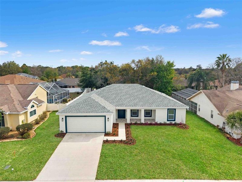 Front exterior of a new home in , Spring Hill, FL, highlighting curb appeal (Image 22). Front exterior of a new home in , Spring Hill, FL, highlighting curb appeal (Image 22).
