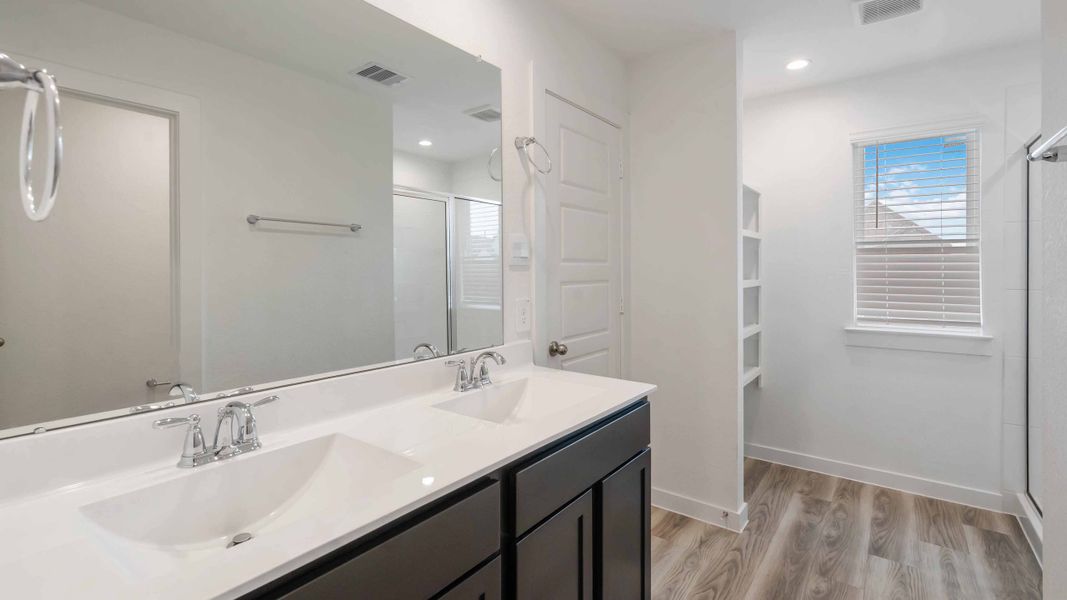 Representative furnished interior of a home built from the Iris by D.R. Horton in City Gate North, Houston (Image 7).