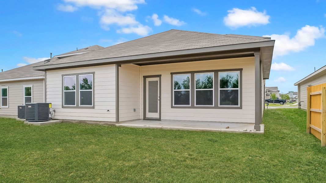Exterior details and patio area of a home in Prairie Lakes, Buda (Image 19).
