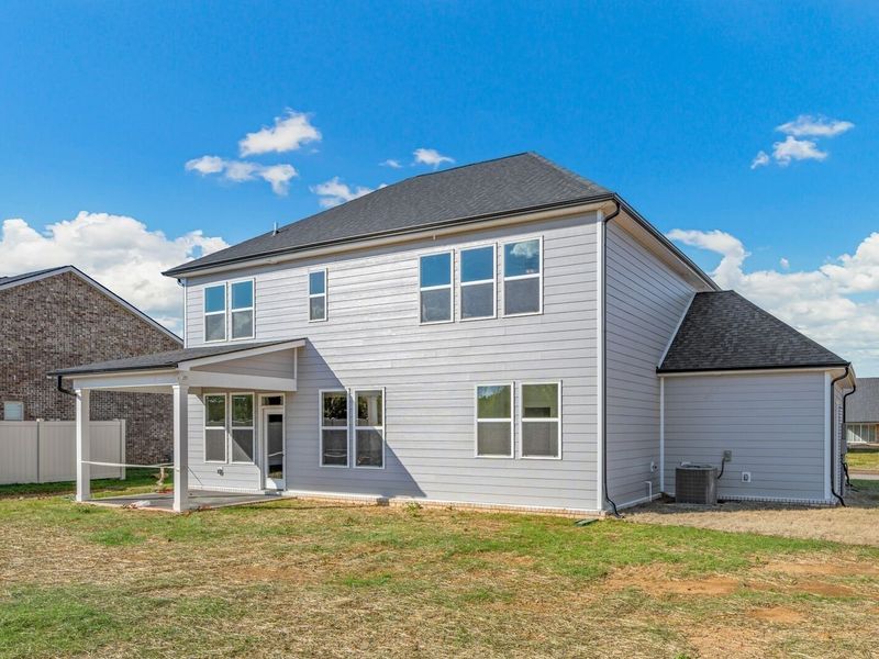 Exterior details and patio area of a home in Woods Crossing, Gallatin (Image 3).