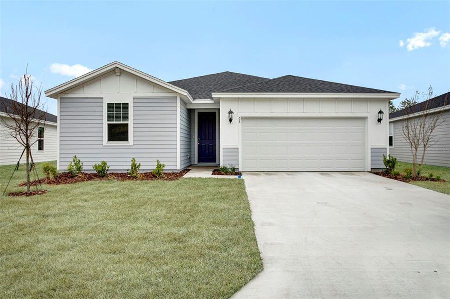 Front exterior of a new home in , Palm Coast, FL, highlighting curb appeal (Image 1). Front exterior of a new home in , Palm Coast, FL, highlighting curb appeal (Image 1).