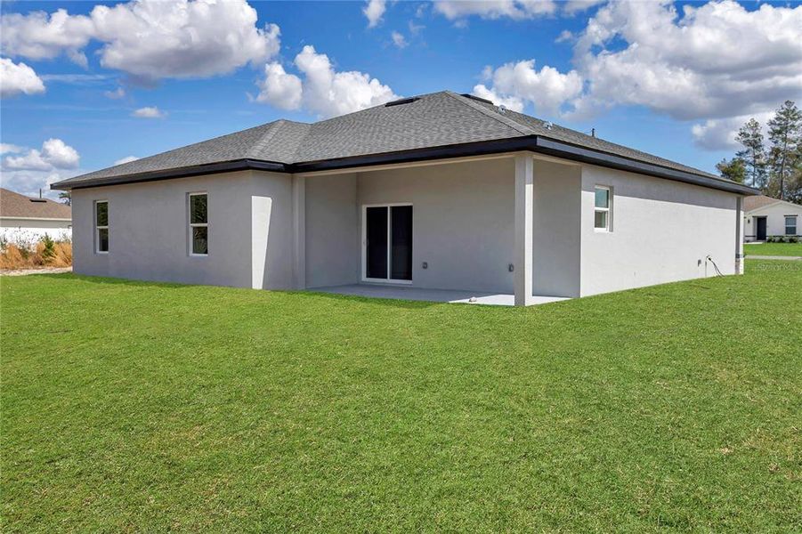 Exterior details and patio area of a home in , Ocala (Image 4).