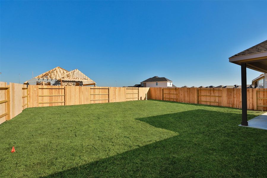Exterior details and patio area of a home in Wildrye, Waller (Image 3).