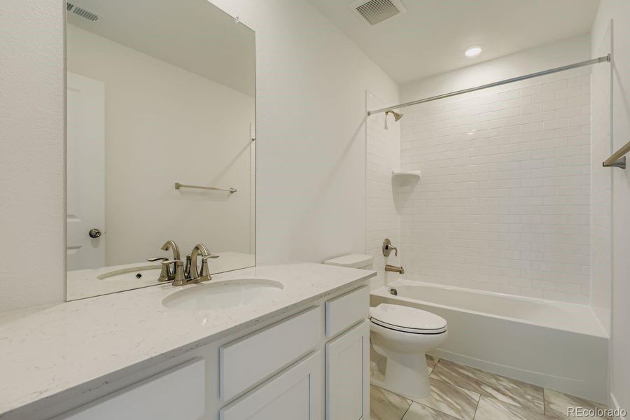 Furnished interior in a model home at Brighton Crossings: The Grand Collection in Brighton (Image 32).