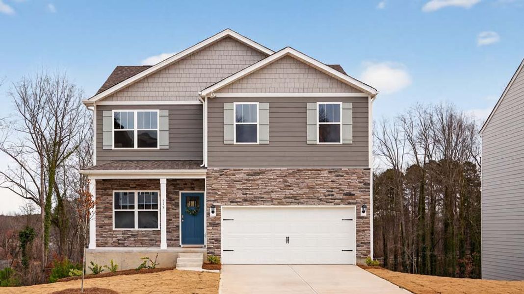 Front exterior of a new home in The Hamptons at Hickory, Hickory, NC, highlighting curb appeal (Image 1). Front exterior of a new home in The Hamptons at Hickory, Hickory, NC, highlighting curb appeal (Image 1).