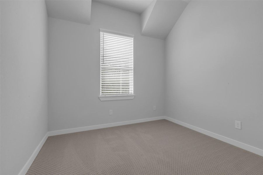 Third bedroom suite located upstairs.