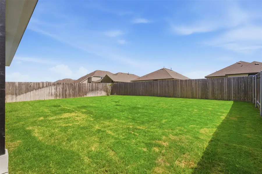 Exterior details and patio area of a home in , Manor (Image 4).