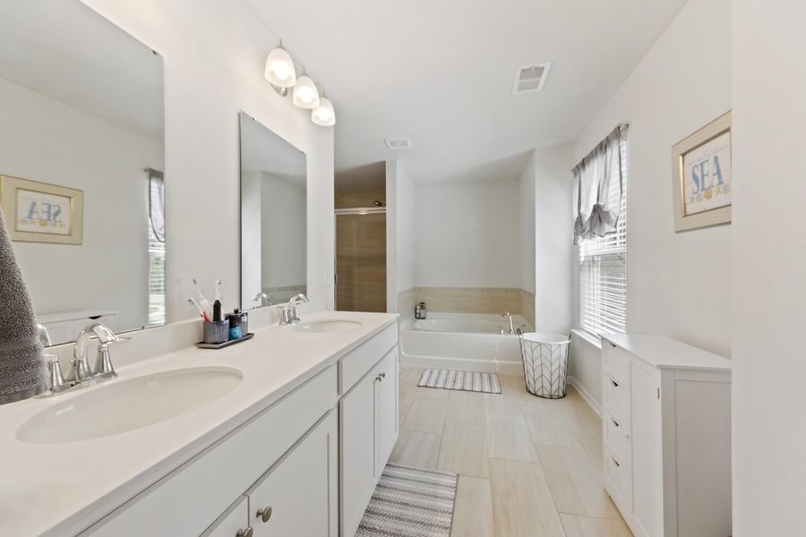 Furnished interior view inside a new home in The Ponds, Summerville (Image 17).