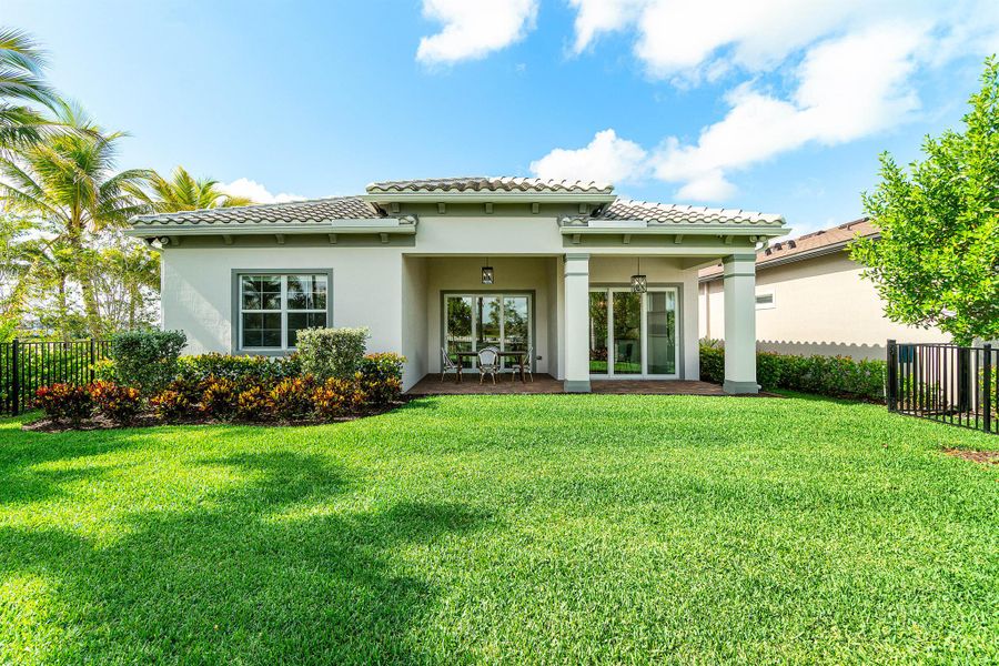 Exterior details and patio area of a home in Avondale at Avenir, Palm Beach Gardens (Image 28). Exterior details and patio area of a home in Avondale at Avenir, Palm Beach Gardens (Image 28).