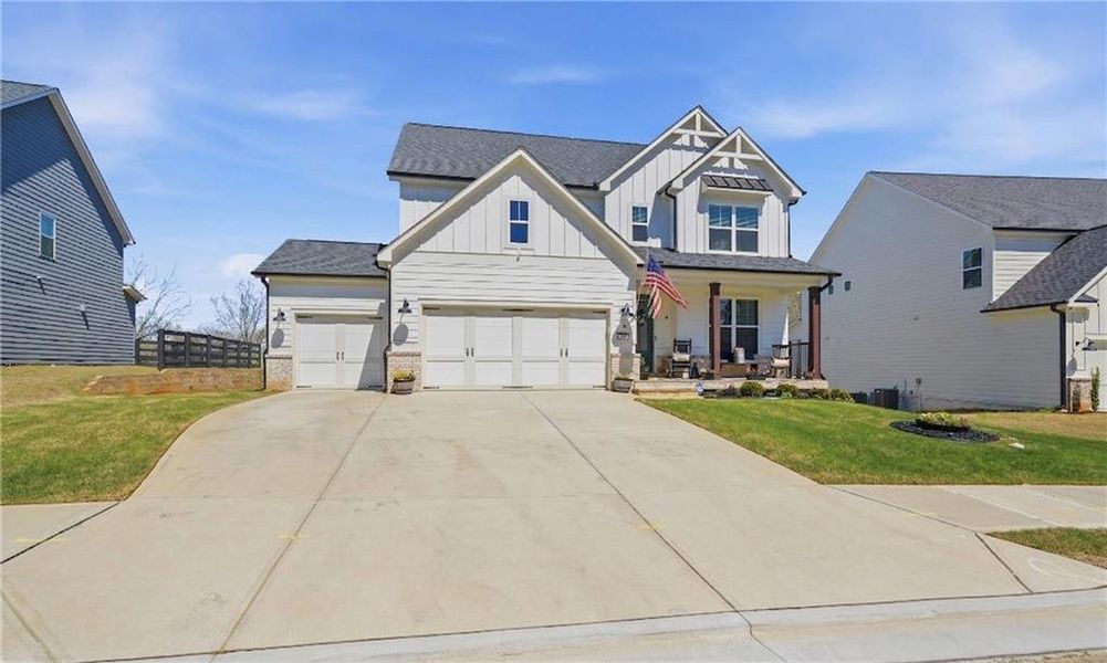 Front exterior of a new home in , Dallas, GA, highlighting curb appeal (Image 24).