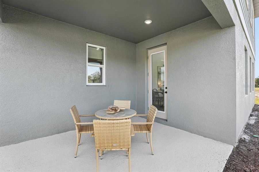 Exterior details and patio area of a home in Hawks Run, Kissimmee (Image 27).
