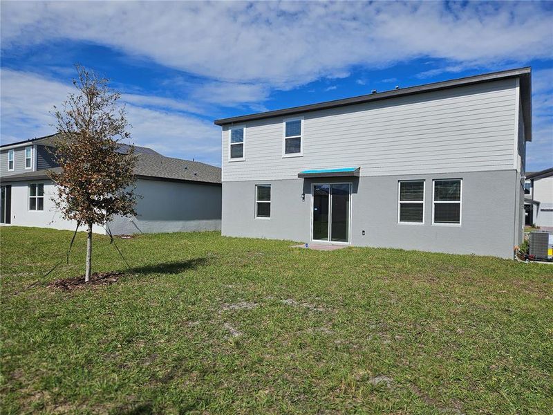Exterior details and patio area of a home in Lawson Dunes - Signature Series, Haines City (Image 4).