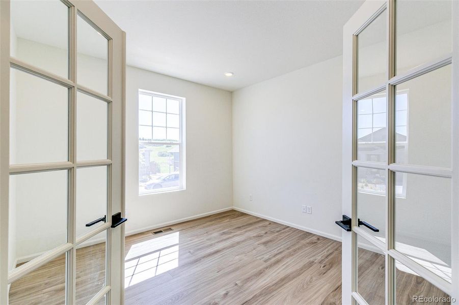 Spacious, unfurnished interior of a new home in Terrain Oak Valley, Castle Rock (Image 36).