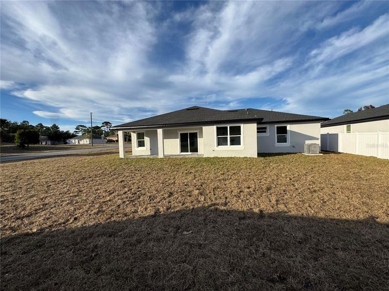 Exterior details and patio area of a home in , Deltona (Image 29).