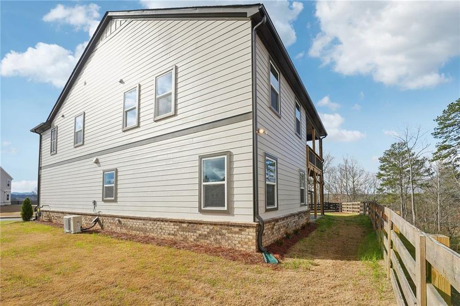 Exterior details and patio area of a home in Tiberon Woods, Cumming (Image 46). Exterior details and patio area of a home in Tiberon Woods, Cumming (Image 46).