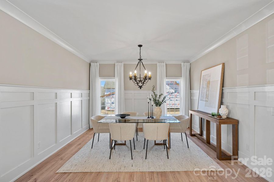 An elegant Dining space accented by wainscoting and architectural detail, perfect for both intimate dinners and celebrations.