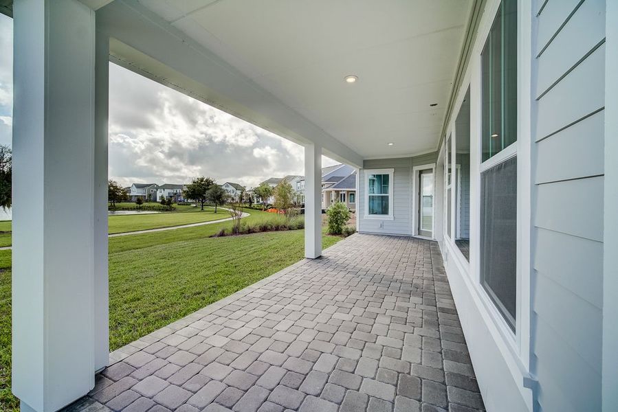 Representative exterior details of a home built from the The Shalimar by David Weekley Homes in Laureate Park at Lake Nona - Park Series, Orlando (Image 3). Representative exterior details of a home built from the The Shalimar by David Weekley Homes in Laureate Park at Lake Nona - Park Series, Orlando (Image 3).