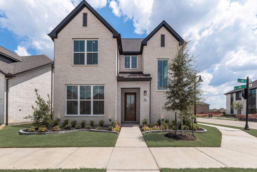Front exterior of a new home in Cottages of Celina, Celina, TX, highlighting curb appeal (Image 1). Front exterior of a new home in Cottages of Celina, Celina, TX, highlighting curb appeal (Image 1).