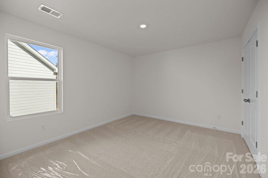Spacious, unfurnished interior of a new home in McFarland Estates, York (Image 20).