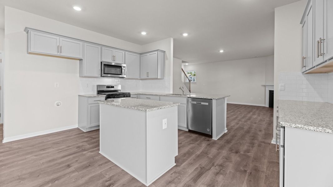 Furnished interior view inside a new home in East Ridge, Ayden (Image 5).