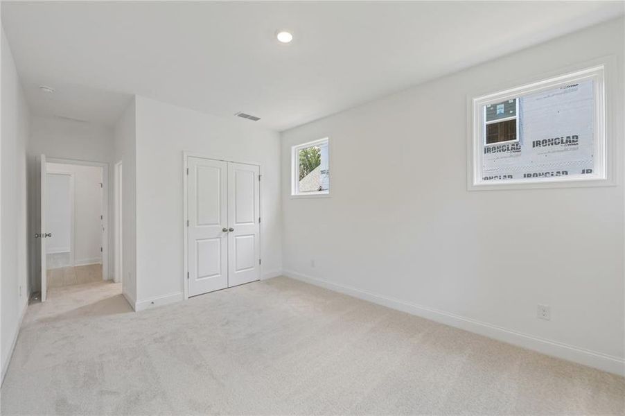Spacious, unfurnished interior of a new home in Bailey Fence, Dacula (Image 61).