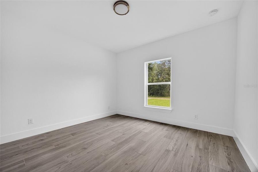 Spacious, unfurnished interior of a new home in , Port Charlotte (Image 18).