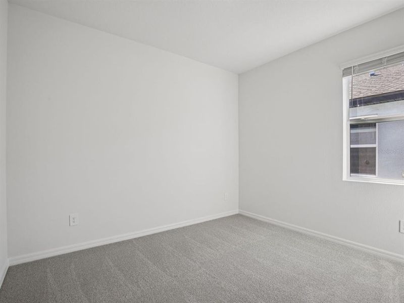 Spacious, unfurnished interior of a new home in Coasterra - Reserve Series, Palmetto (Image 20).