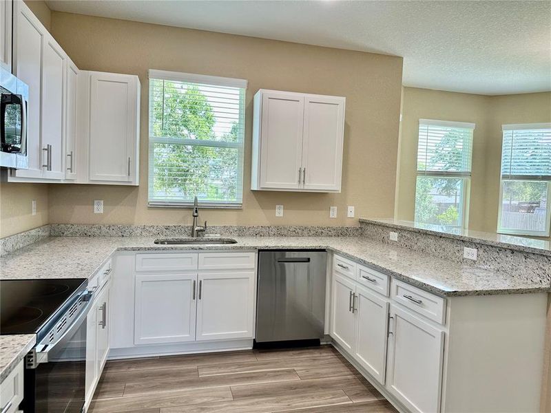 Furnished interior view inside a new home in , Weeki Wachee (Image 7).