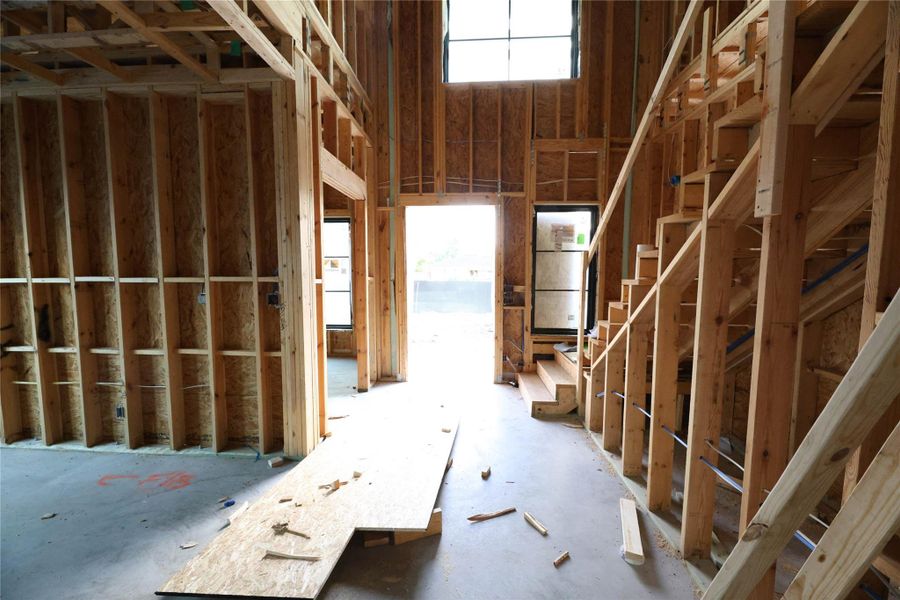 Guests are greeted by soaring ceilings, wood floors, 1st Floor Study & Formal Dining at front entry.