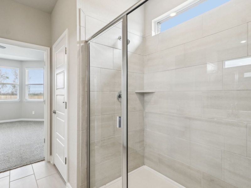 Primary suite bathroom in the Medina floorplan at a Meritage Homes community. Primary suite bathroom in the Medina floorplan at a Meritage Homes community.