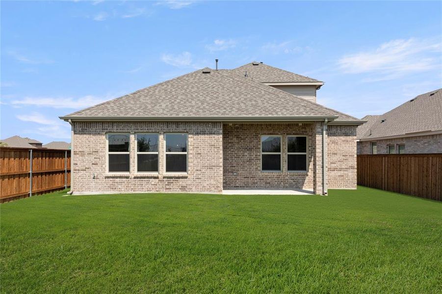 Front exterior of a new home in Las Lomas, Heath, TX, highlighting curb appeal (Image 18).