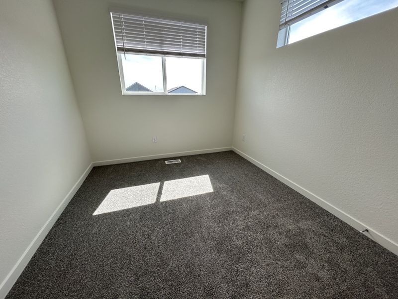 Spacious, unfurnished interior of a new home in Liberty Draw, Evans (Image 14).